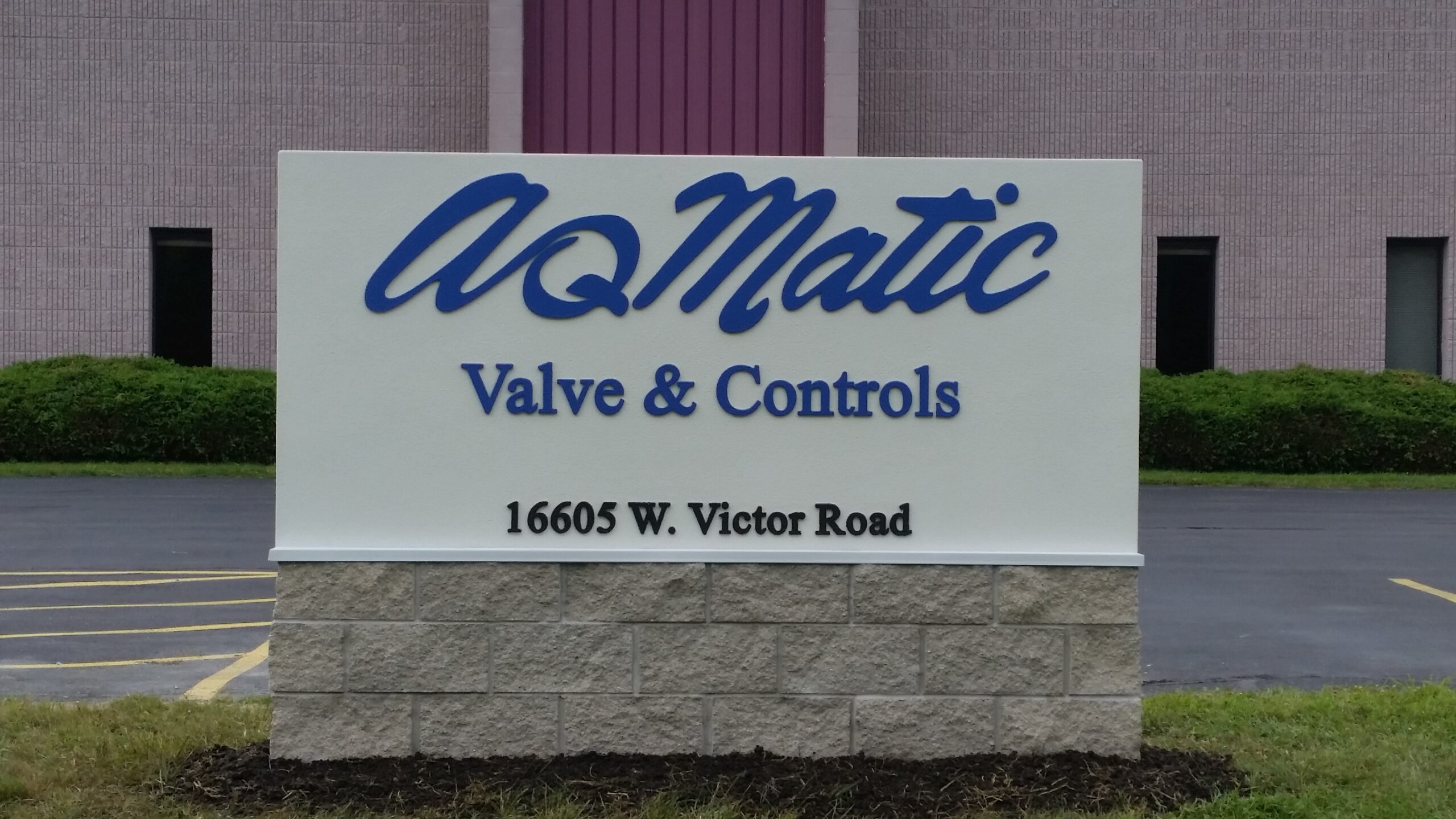 AQ Matic Valve & Controls company sign